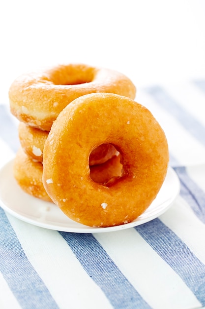 Donut isolated on a white plate