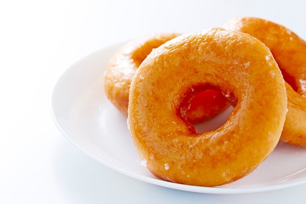 Donut isolated on a white plate