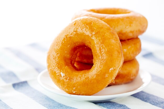 Donut isolated on a white plate