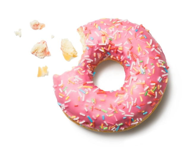 Photo donut with pink icing on a white background view from above