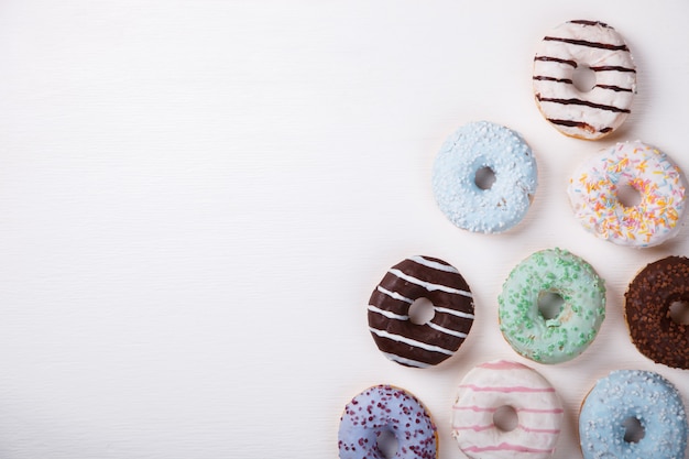 Donuts in colored glazes .Pastries,dessert.