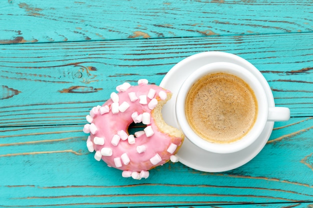 Donuts on colorful wooden table