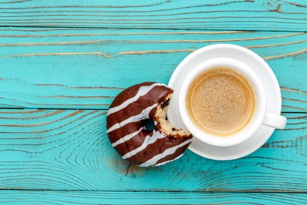 Donuts on colorful wooden table