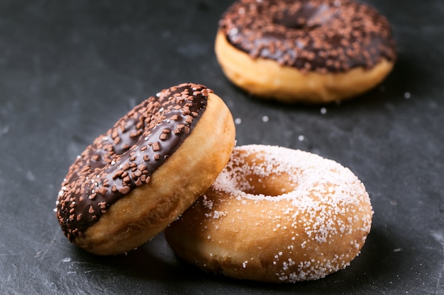 Donuts over dark background