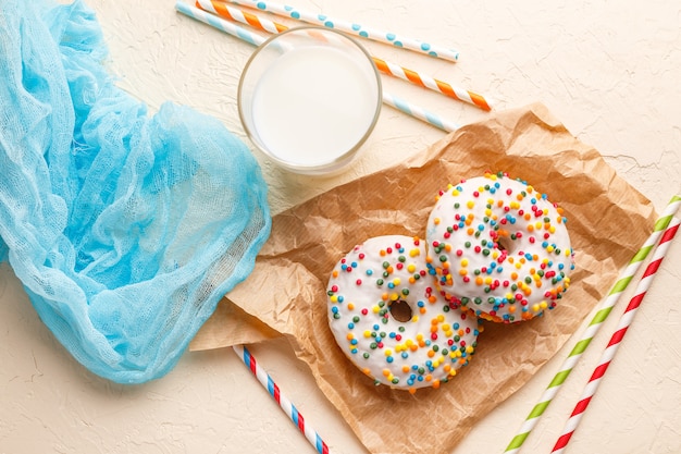 Donuts glazed with various sprinkles