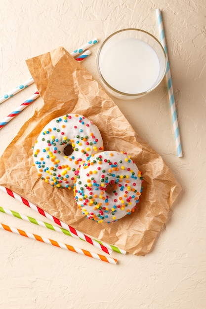 Donuts glazed with various sprinkles