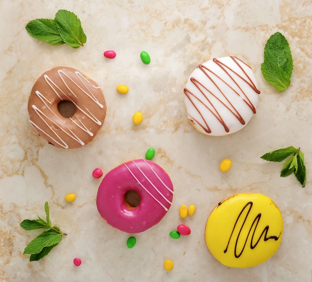 Donuts, mint leafs  on marble