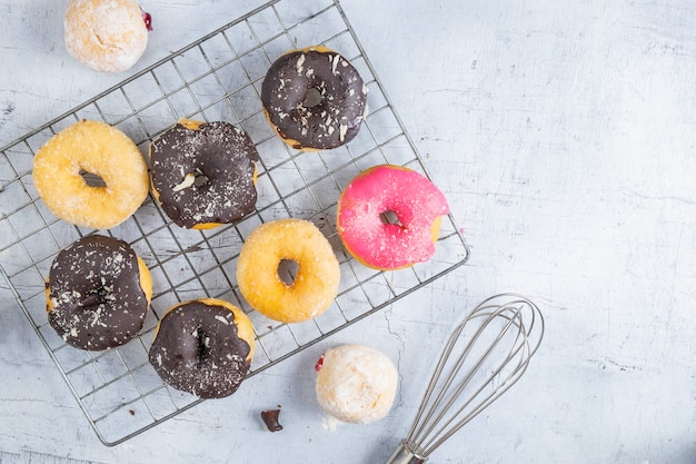 Donuts on a white wood background