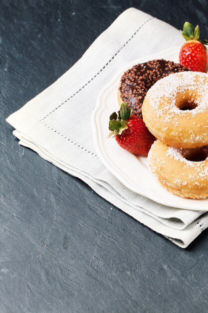 Donuts with fresh strawberries