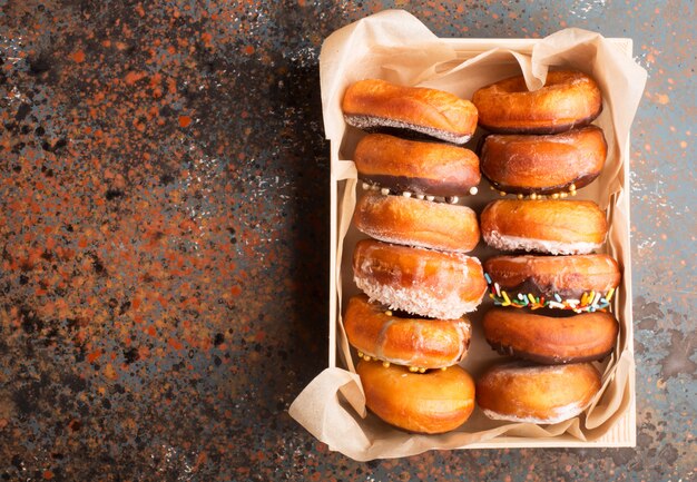 Donuts with sprinkles in a box