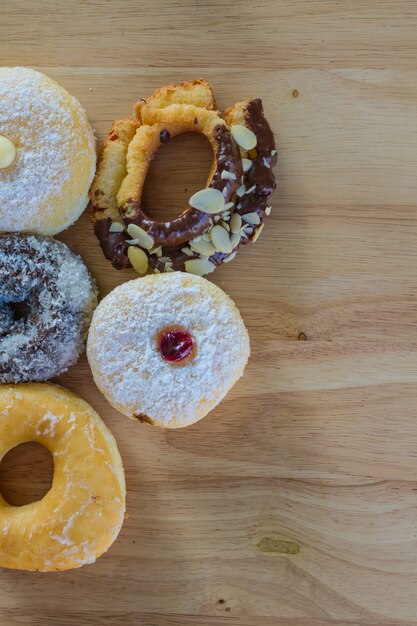 Donuts on wooden background