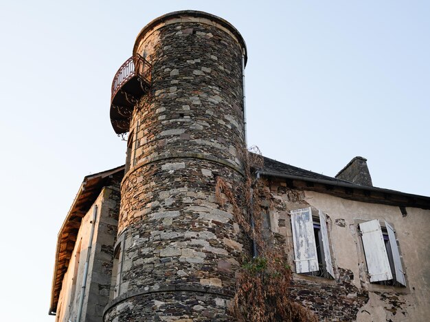 Donzenac stone turret tower of a house in the village