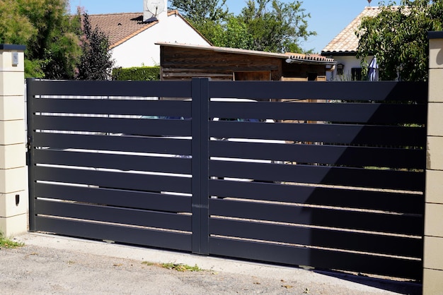 Door black access aluminum gray gate and portal grey of suburb house