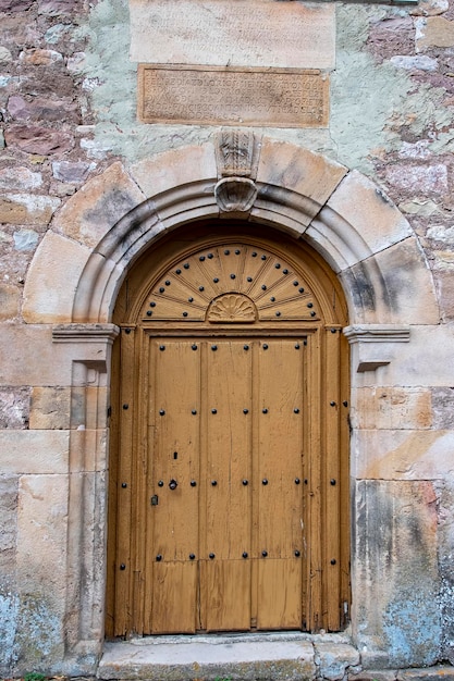 Door of the romanesque church of naveda in cantabria