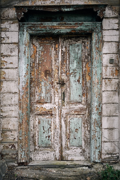 Door in a traditional old wooden abandoned house