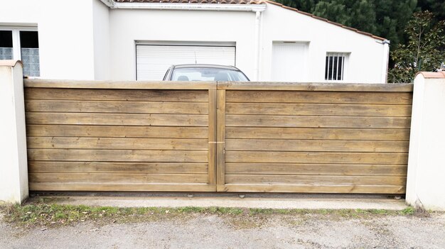 Door wooden gate facade in street view outdoor home portal entrance