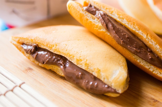 Dorayaki is a type of Japanese sweet that consists of two round-shaped cakes filled with ingredients