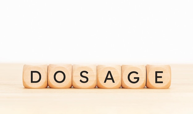 Dosage word on wooden blocks Copy space