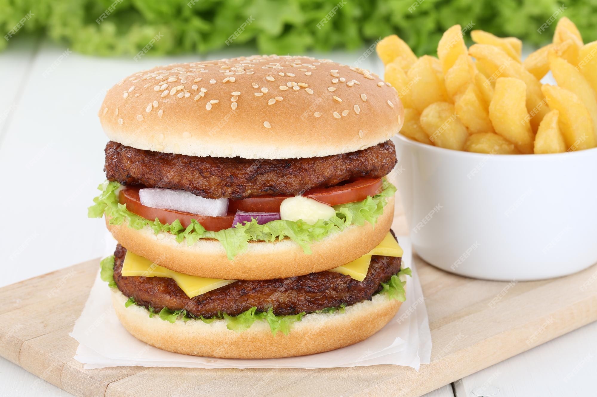 Premium Photo | Double burger hamburger with fries