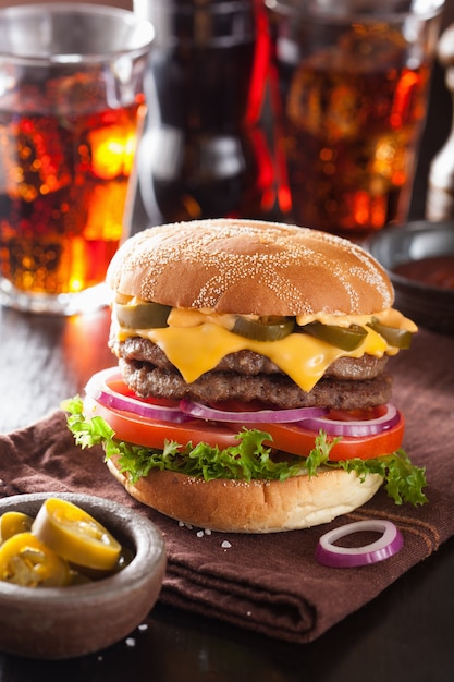 Double cheese burger with jalapeno tomato onion