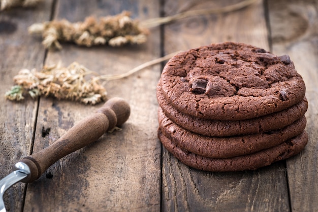 Double chocolate chip cookies on wood