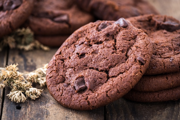 Double chocolate chip cookies on wood