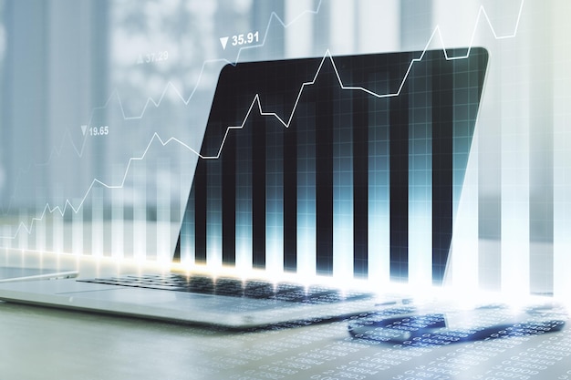 Double exposure of abstract creative financial chart on modern laptop background research and strategy concept