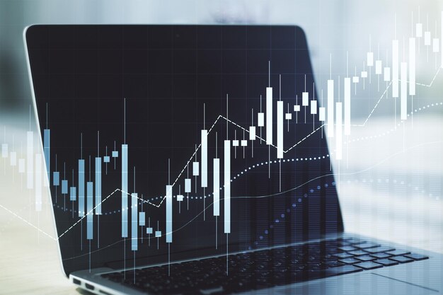 double exposure of abstract creative financial chart on modern laptop background research and strategy concept