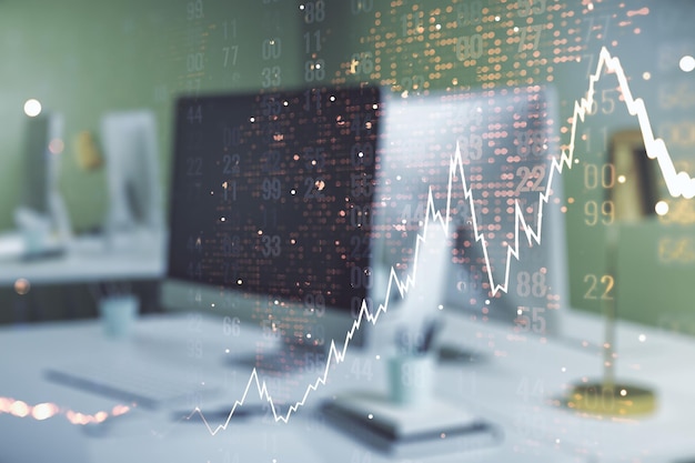 Double exposure of abstract creative financial chart with world map on laptop background research and strategy concept