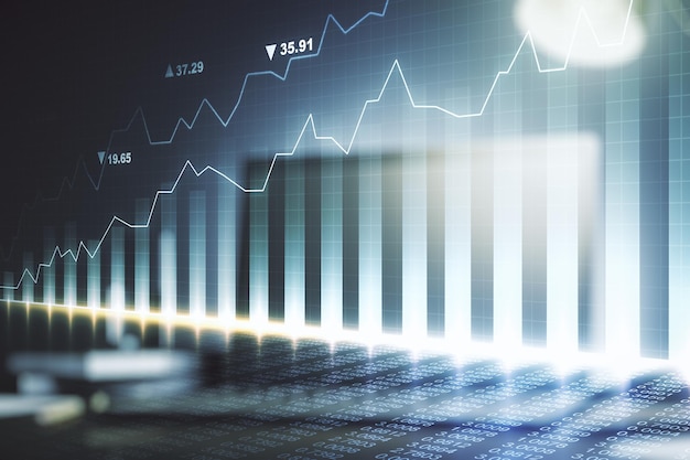 Double exposure of abstract creative financial diagram on modern laptop background banking and accounting concept