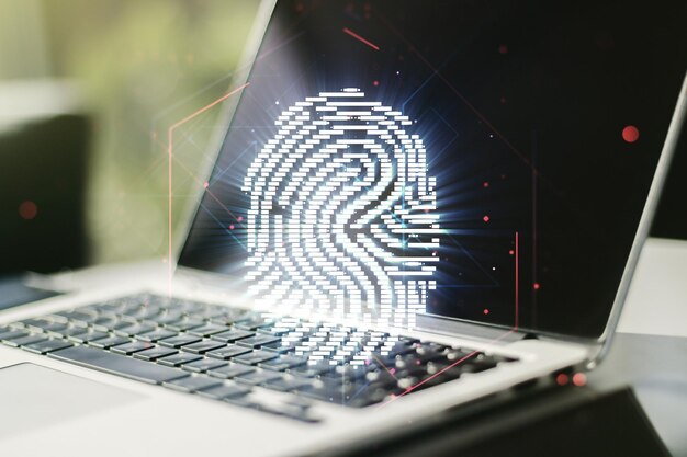 Double exposure of abstract creative fingerprint hologram on computer background protection of personal information concept