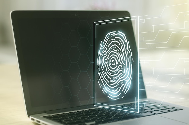 Double exposure of abstract creative fingerprint hologram on computer background protection of personal information concept