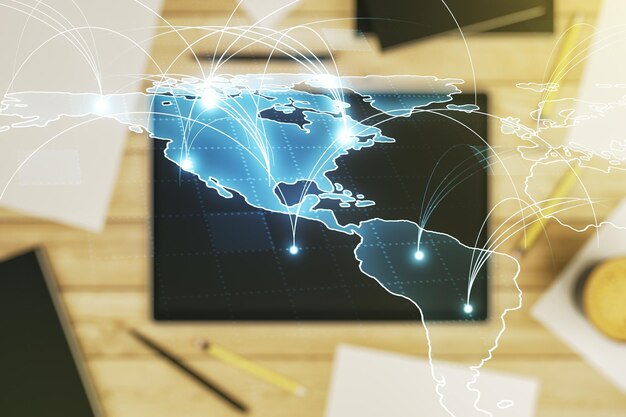 Double exposure of abstract digital world map with connections and modern digital tablet on background big data and blockchain concept