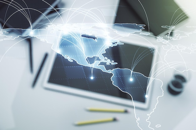 Double exposure of abstract digital world map with connections and modern digital tablet on background big data and blockchain concept