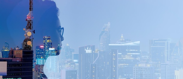 Double exposure of Asian woman and Telecommunication tower with 5G cellular network antenna