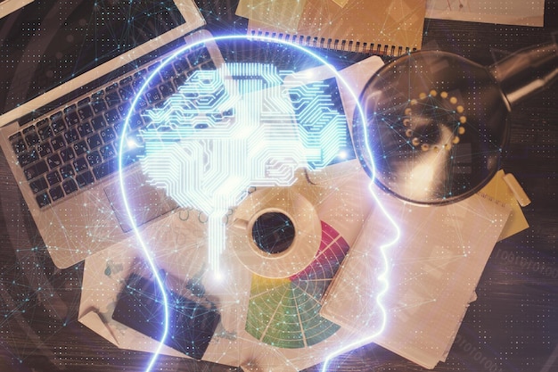 Double exposure of brain drawing hologram over topview work table background with computer Concept of big data