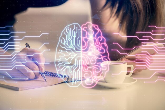 Double exposure of brain sketch hologram and woman holding and using a mobile device