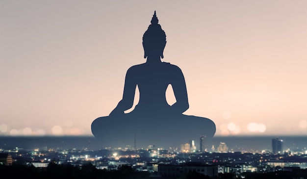 Double exposure of Buddha  religion and city concept