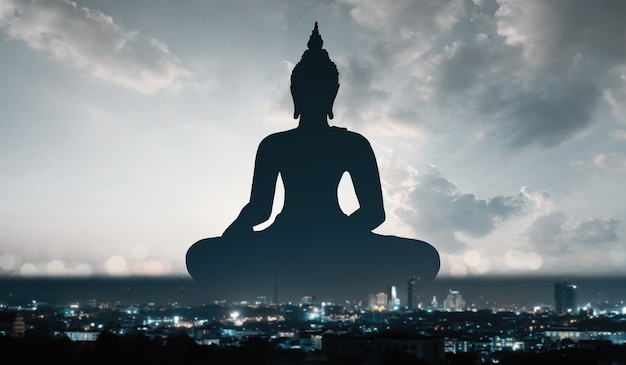 Double exposure of Buddha  religion and city concept
