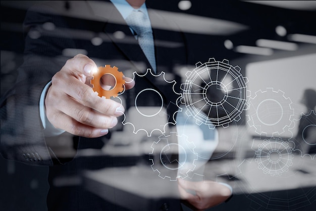 Double exposure of business businessman hand shows gear to success concept