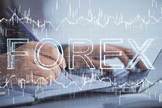 Double exposure of businesswoman hands typing on computer and forex chart hologram drawing Financial analysis concept