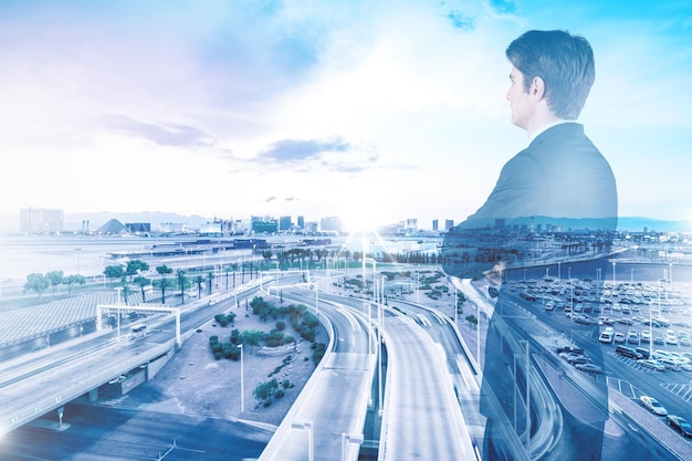 Double exposure of a city and a businessman