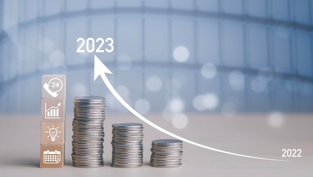 Double exposure of coins on the white background for finance and banking and Money spending planning and investment budget Business saving money concept Copy space new year 20222023 concept