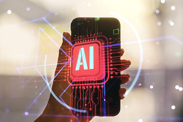 Double exposure of creative artificial Intelligence abbreviation and hand with cellphone on background. Future technology and AI concept