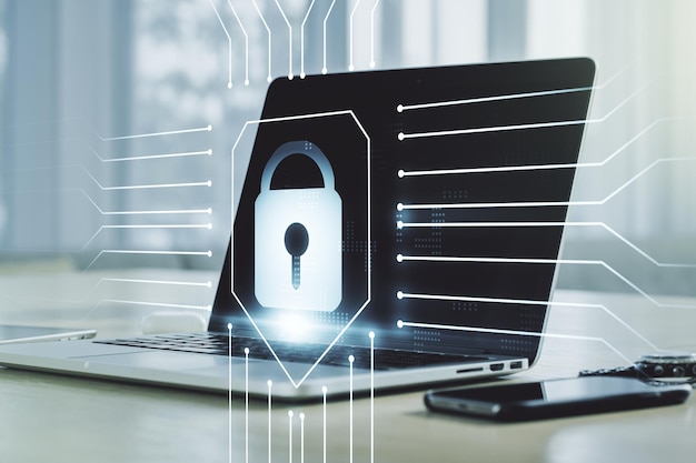 double exposure of creative lock hologram with chip on laptop background information security concept