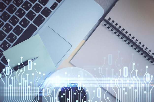 double exposure of data theme drawing hologram over topview work table background with computer concept of technology
