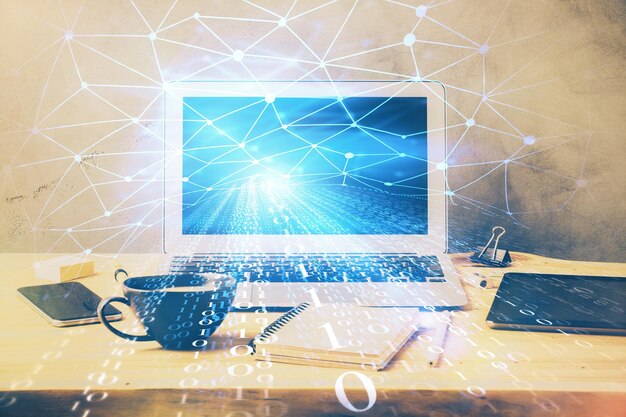 Double exposure of desktop computer and technology theme hologram Concept of software development