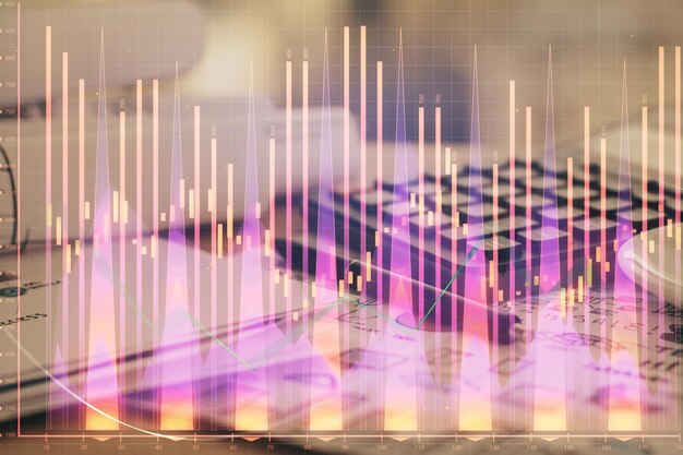 Double exposure of financial chart drawings and desk with open notebook background Concept of forex market