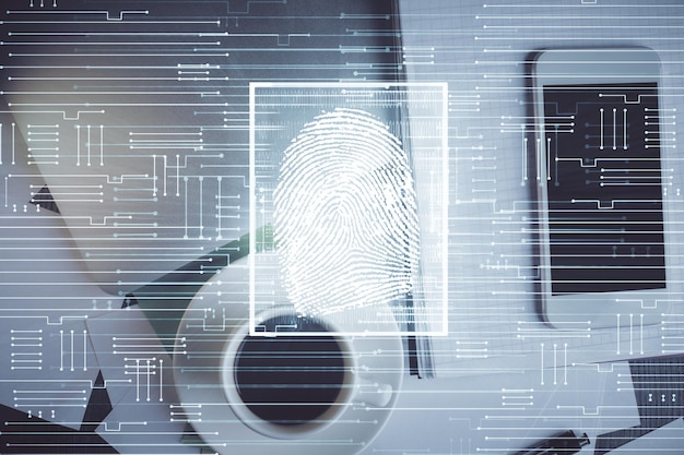 Double exposure of finger print over table with phone Top view Concept of mobile security