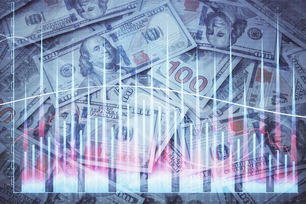 Double exposure of forex graph drawing over us dollars bill background Concept of financial markets